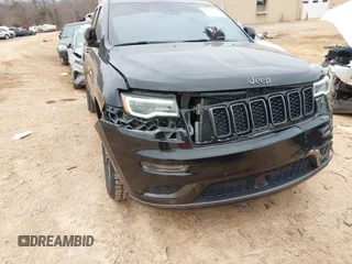 2018 Jeep Grand Cherokee High Altitude with VIN 1C4RJFCT5JC283704, listed as a IAAI auction lot 41613275 with 134,134 mi miles. Bid and sale history available at carsss.com. Image 6.