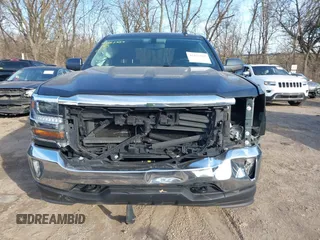 2017 Chevrolet Silverado 1500 LT with VIN 3GCUKREC5HG348435, listed as a IAAI auction lot 41821369 with 140,000 mi miles and . Bid and sale history available at DreamBid. Image 13.