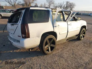 2009 GMC Yukon SLT 4SB with VIN 1GKFK33069R223478, listed as a IAAI auction lot 41466388 with 241,959 mi miles and . Bid and sale history available at DreamBid. Image 4.