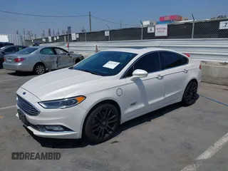2017 Ford Fusion Titanium with VIN 3FA6P0SU7HR264615, listed as a IAAI auction lot 42747242 with 196,483 mi miles and . Bid and sale history available at DreamBid. Image 2.