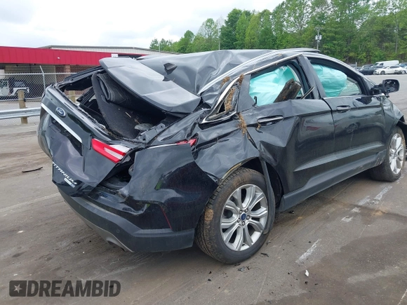 2020 Ford Edge Titanium z VIN 2FMPK4K98LBB12684, wystawiony jako IAAI lot #42134532 z przebiegiem 103 786 mil mil oraz . Historia ofert i sprzedaży dostępna na DreamBid. Obrazek 4.