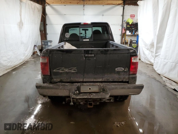 2002 Ford Ranger with VIN 1FTZR15U52PA08409, listed as a Copart auction lot 87858015 with 128,892 mi miles and Salvage Title. Bid and sale history available at DreamBid. Image 6.