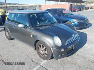 2006 MINI Hardtop with VIN WMWRC33586TJ75043, listed as a IAAI auction lot 41948235 with 138,402 mi miles and . Bid and sale history available at DreamBid. Image 1.