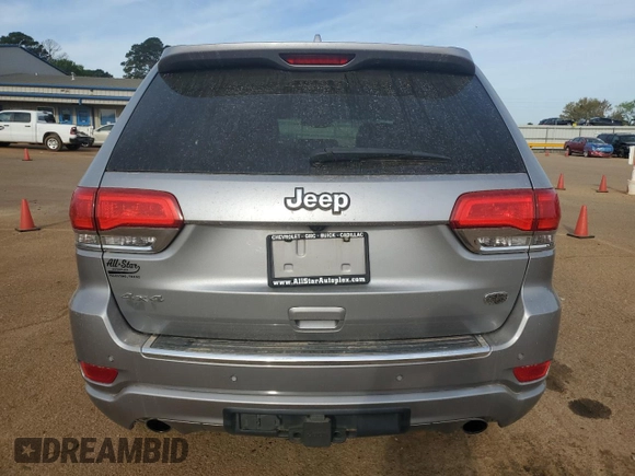2016 Jeep Grand Cherokee Overland with VIN 1C4RJFCT2GC320247, listed as a Copart auction lot 50832195 with 104,300 mi miles and Salvage title. Bid and sale history available at DreamBid. Image 6.