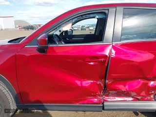 2019 Mazda CX-5 Touring with VIN JM3KFBCMXK1658009, listed as a IAAI auction lot 42028300 with 33,419 mi miles. Bid and sale history available at carsss.com. Image 6.
