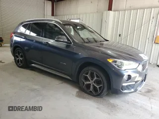 2017 BMW X1 xDrive28i with VIN WBXHT3C34H5F84621, listed as a Copart auction lot 63252115 with 95,170 mi miles and Clean title. Bid and sale history available at DreamBid. Image 4.
