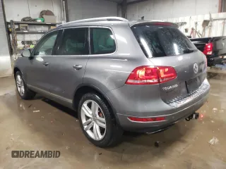 2013 Volkswagen Touareg Lux with VIN WVGEF9BP6DD002607, listed as a Copart auction lot 83420704 with 143,571 mi miles and Salvage Title. Bid and sale history available at DreamBid. Image 2.