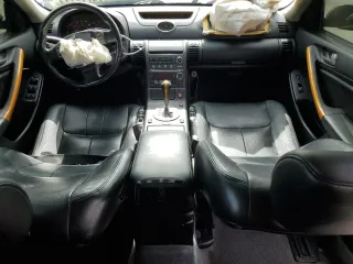 2004 Infiniti G35 w/Leather with VIN JNKCV51F94M717606, listed as a Copart auction lot 74712714 with 197,420 mi miles and Salvage Title. Bid and sale history available at DreamBid. Image 8.