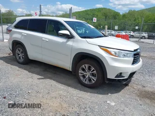 2015 Toyota Highlander LE z VIN 5TDBKRFH3FS197580, wystawiony jako IAAI lot #42215541 z przebiegiem 148 345 mil mil oraz . Historia ofert i sprzedaży dostępna na DreamBid. Obrazek 1.