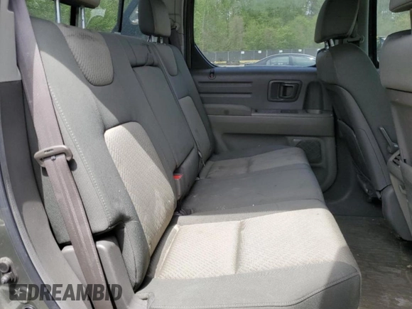 2006 Honda Ridgeline RTS z VIN 2HJYK16476H544699, wystawiony jako Copart lot #53528725 z przebiegiem 225 881 mil mil oraz Szkoda całkowita • Salvage title. Historia ofert i sprzedaży dostępna na DreamBid. Obrazek 10.