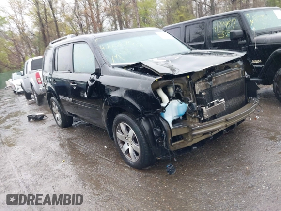 2014 Honda Pilot Touring with VIN 5FNYF4H91EB055741, listed as a IAAI auction lot 42006752 with 222,308 mi miles and . Bid and sale history available at carsss.com. Image 1.