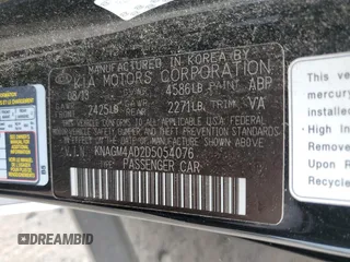 2013 Kia Optima EX with VIN KNAGM4AD2D5054076, listed as a Copart auction lot 59565815 with 111,887 mi miles and Salvage title. Bid and sale history available at DreamBid. Image 12.