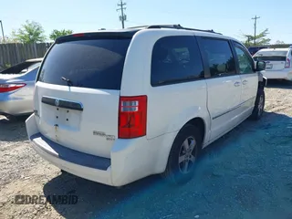 2010 Dodge Grand Caravan SXT with VIN 2D4RN5D12AR210330, listed as a IAAI auction lot 42146969 with 233,607 mi miles and . Bid and sale history available at DreamBid. Image 4.