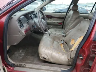 2000 Mercury Grand Marquis LS z VIN 2MEFM75WXYX726819, wystawiony jako Copart lot #52873675 z przebiegiem 144 692 mil mil oraz Nie do naprawy. Historia ofert i sprzedaży dostępna na DreamBid. Obrazek 7.