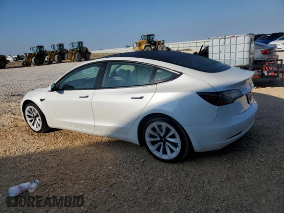 2022 Tesla Model 3 with VIN 5YJ3E1EA7NF184741, listed as a Copart auction lot 82487494 with 133,215 mi miles and Clean Title. Bid and sale history available at DreamBid. Image 2.