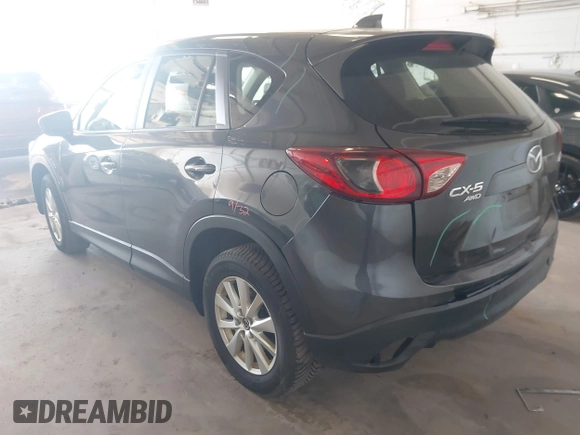 2014 Mazda CX-5 Sport with VIN JM3KE4BE5E0375360, listed as a IAAI auction lot 41788977 with 135,487 mi miles. Bid and sale history available at carsss.com. Image 3.