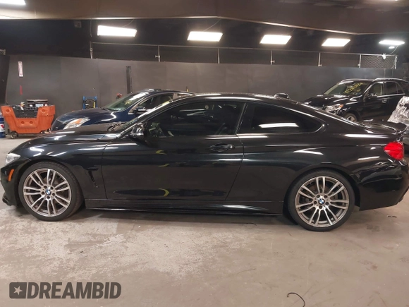 2015 BMW 4 Series 428i z VIN WBA3N3C59FK234025, wystawiony jako IAAI lot #42301785 z przebiegiem 66 729 mil mil oraz . Historia ofert i sprzedaży dostępna na DreamBid. Obrazek 14.