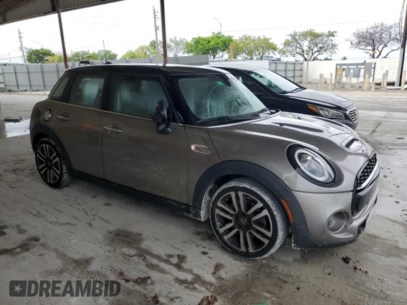 2021 MINI Hardtop 4 Door Cooper S with VIN WMWXU9C0XM2M90621, listed as a Copart auction lot 52513635 with 57,419 mi miles and Salvage title. Bid and sale history available at DreamBid. Image 4.