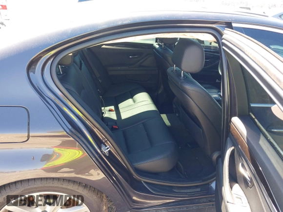 2014 BMW 5 Series 535i with VIN WBA5B1C54ED477525, listed as a IAAI auction lot 41692887 with 122,288 mi miles. Bid and sale history available at carsss.com. Image 8.
