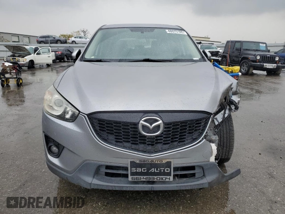 2015 Mazda CX-5 Touring with VIN JM3KE2CY4F0469096, listed as a Copart auction lot 48075105 with 131,788 mi miles and Salvage Title. Bid and sale history available at carsss.com. Image 5.