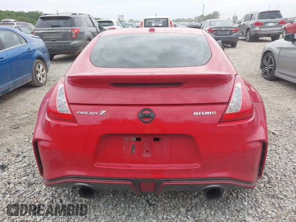 2016 Nissan 370Z Sport z VIN JN1AZ4EH7GM931035, wystawiony jako IAAI lot #42311165 z przebiegiem 83 947 mil mil oraz . Historia ofert i sprzedaży dostępna na DreamBid. Obrazek 16.