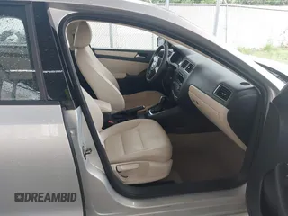 2012 Volkswagen Jetta SE with VIN 3VWDP7AJ9CM320638, listed as a IAAI auction lot 42227679 with 148,629 mi miles and . Bid and sale history available at DreamBid. Image 5.