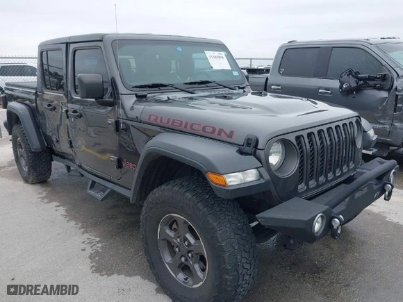2020 Jeep Gladiator Rubicon with VIN 1C6JJTBG8LL135573, listed as a IAAI auction lot 41585896 with 79,070 mi miles. Bid and sale history available at carsss.com. Image 1.