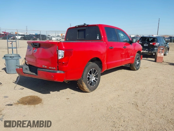2022 Nissan Titan S with VIN 1N6AA1EC5NN104856, listed as a IAAI auction lot 42003205 with 49,099 mi miles and . Bid and sale history available at DreamBid. Image 4.