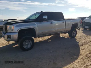 2015 GMC Sierra 2500HD available WiFi Denali with VIN 1GT120E84FF511245, listed as a Copart auction lot 87236204 with 103,574 mi miles and Salvage Title. Bid and sale history available at carsss.com. Image 1.