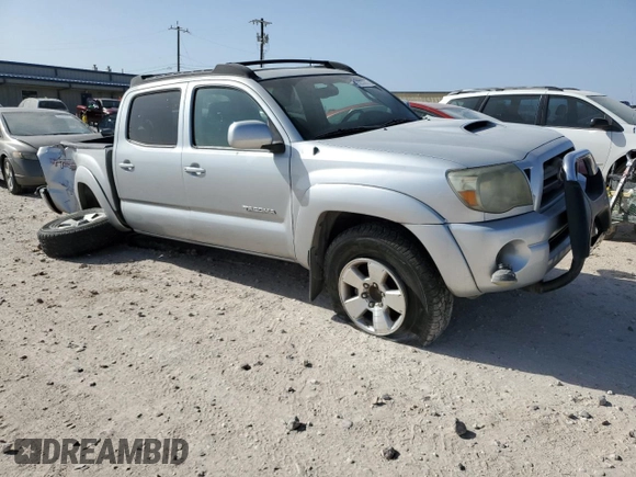 2009 Toyota Tacoma PreRunner with VIN 3TMJU62N69M079303, listed as a Copart auction lot 49885905 with 299,958 mi miles and Salvage title. Bid and sale history available at DreamBid. Image 4.