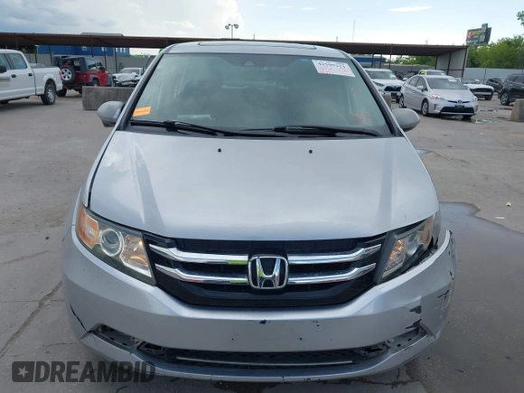 2014 Honda Odyssey EX-L with VIN 5FNRL5H60EB058753, listed as a IAAI auction lot 42595221 with 194,995 mi miles and . Bid and sale history available at DreamBid. Image 12.