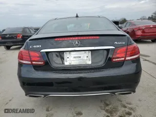 2015 Mercedes-Benz E-Class E 400 with VIN WDDKJ6HB8FF294709, listed as a Copart auction lot 84589984 with 84,890 mi miles and Salvage Title. Bid and sale history available at carsss.com. Image 6.
