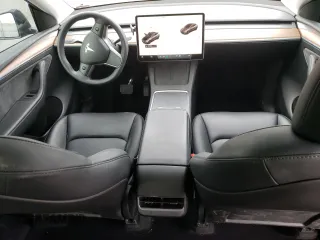 2024 Tesla Model Y Long Range with VIN 7SAYGAEE5RF038446, listed as a Copart auction lot 48868025 with 10,410 mi miles and Salvage Title. Bid and sale history available at DreamBid. Image 8.