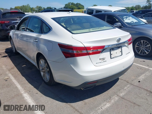 2014 Toyota Avalon Limited with VIN 4T1BK1EB0EU122498, listed as a IAAI auction lot 40248080 with 126,818 mi miles and . Bid and sale history available at DreamBid. Image 3.