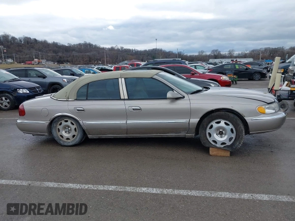 2001 Lincoln Continental with VIN 1LNHM97VX1Y627039, listed as a IAAI auction lot 41482016 with 143,317 mi miles and . Bid and sale history available at DreamBid. Image 13.