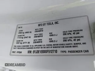 2019 Tesla Model 3 Long Range with VIN 5YJ3E1EBXKF512710, listed as a IAAI auction lot 42063737 with 90,721 mi miles and . Bid and sale history available at DreamBid. Image 9.