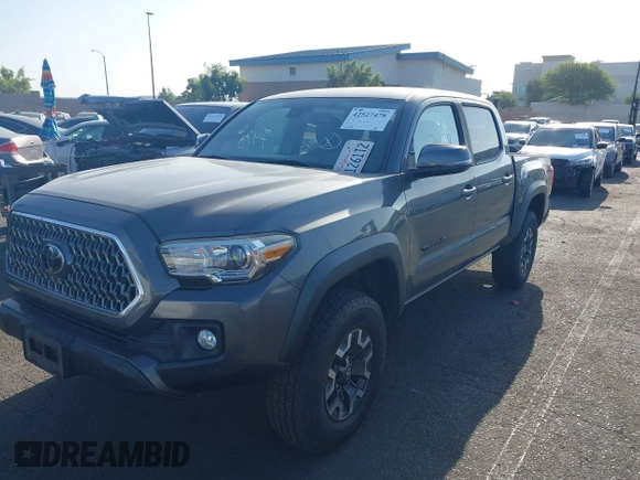 2019 Toyota Tacoma SR with VIN 3TMCZ5AN7KM251625, listed as a IAAI auction lot 42527478 with 45,689 mi miles and . Bid and sale history available at DreamBid. Image 19.