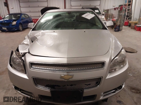 2012 Chevrolet Malibu LTZ with VIN 1G1ZG5E77CF375464, listed as a IAAI auction lot 41509140 with 197,329 mi miles and . Bid and sale history available at DreamBid. Image 6.