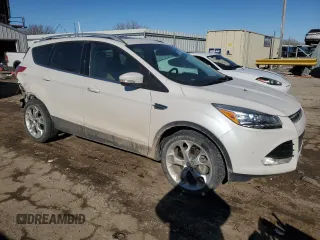 2015 Ford Escape Titanium with VIN 1FMCU9JX7FUA42373, listed as a Copart auction lot 42135485 with 121,080 mi miles and Salvage Title. Bid and sale history available at carsss.com. Image 4.