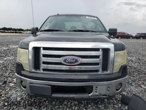 2011 Ford F-150 XL с VIN 1FTEX1CM9BFB96011, выставлен на аукционе Copart как лот 59509795 с пробегом 244 012 миль миль и Списание • Salvage title. История ставок и продаж доступна на DreamBid. Изображение 5.