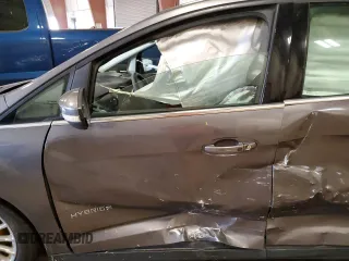 2013 Ford C-Max SEL z VIN 1FADP5BU7DL518398, wystawiony jako Copart lot #49682565 z przebiegiem Nie podano mil oraz Tytuł czysty. Historia ofert i sprzedaży dostępna na DreamBid. Obrazek 7.