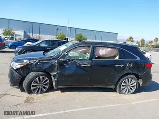 2016 Acura MDX w/Tech/Entertainment with VIN 5FRYD4H64GB045671, listed as a IAAI auction lot 41888947 with 71,084 mi miles. Bid and sale history available at carsss.com. Image 14.