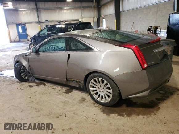 2014 Cadillac CTS Performance with VIN 1G6DG1E32E0166570, listed as a Copart auction lot 58815315 with 46,870 mi miles and Salvage title. Bid and sale history available at DreamBid. Image 2.