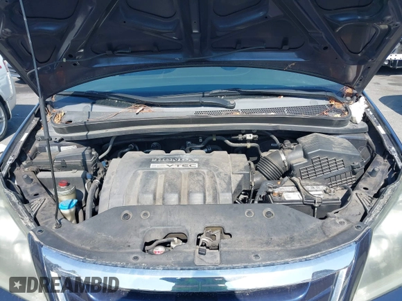 2008 Honda Odyssey LX with VIN 5FNRL38268B025424, listed as a IAAI auction lot 42432326 with 210,644 mi miles and . Bid and sale history available at DreamBid. Image 10.