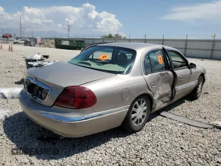 2001 Lincoln Continental with VIN 1LNHM97V21Y698784, listed as a Copart auction lot 64040134 with Not Provided miles and Salvage Title. Bid and sale history available at DreamBid. Image 3.