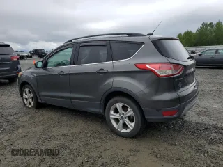 2016 Ford Escape SE z VIN 1FMCU0GX9GUC69200, wystawiony jako Copart lot #57565265 z przebiegiem 131 353 mil mil oraz Czysty tytuł • Clean title. Historia ofert i sprzedaży dostępna na DreamBid. Obrazek 2.