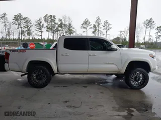 2016 Toyota Tacoma SR with VIN 5TFCZ5AN3GX039919, listed as a IAAI auction lot 41607382 with 107,703 mi miles. Bid and sale history available at carsss.com. Image 13.