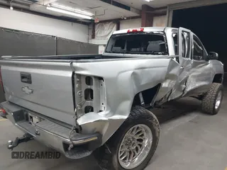 2018 Chevrolet Silverado 1500 LT with VIN 1GCVKREC1JZ151188, listed as a IAAI auction lot 42153618 with 82,391 mi miles and . Bid and sale history available at DreamBid. Image 4.