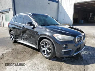 2017 BMW X1 sDrive28i z VIN WBXHU7C34HP924632, wystawiony jako Copart lot #56169005 z przebiegiem 203 811 mil mil oraz Czysty tytuł • Clean title. Historia ofert i sprzedaży dostępna na DreamBid. Obrazek 4.