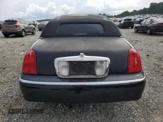 2000 Lincoln Town Car Executive с VIN 1L1FM81W8YY771526, выставлен на аукционе Copart как лот 65654725 с пробегом 51 048 миль миль и Чистый • Clean title. История ставок и продаж доступна на DreamBid. Изображение 6.